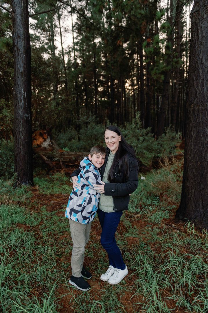 amy green photographer cape town with son in a forest