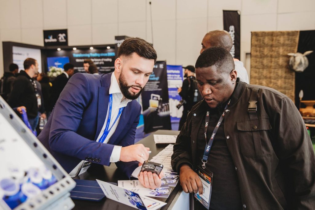 Engaging Just Markets team interacting with clients and investors at CTICC in Cape Town