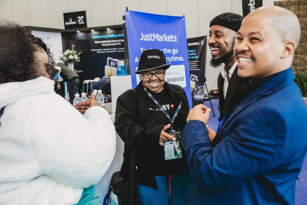 Engaging Just Markets team interacting with clients and investors at CTICC in Cape Town