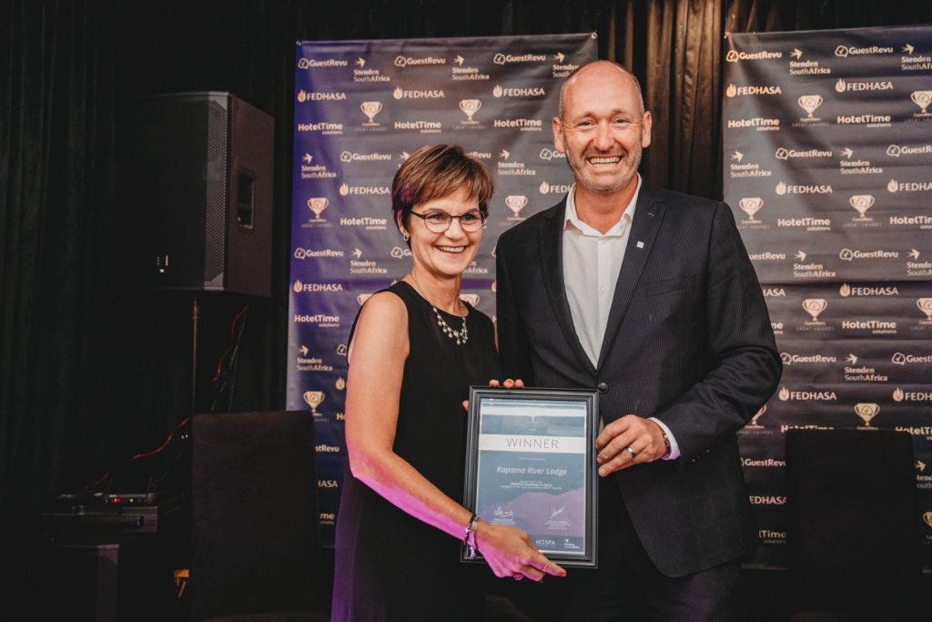 Winners receiving recognition at the GuestRevu GREAT Awards dinner