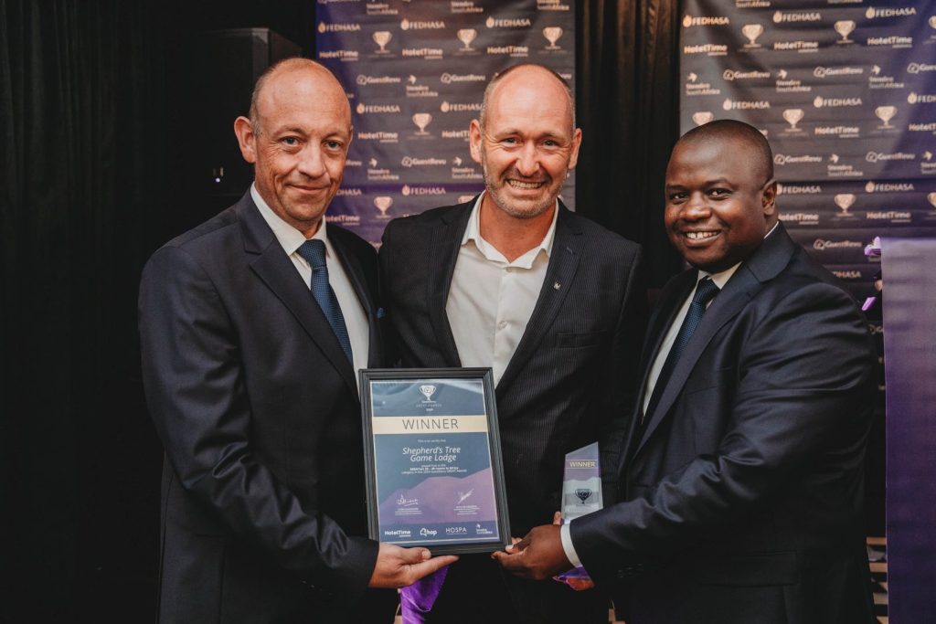 Winners receiving recognition at the GuestRevu GREAT Awards dinner
