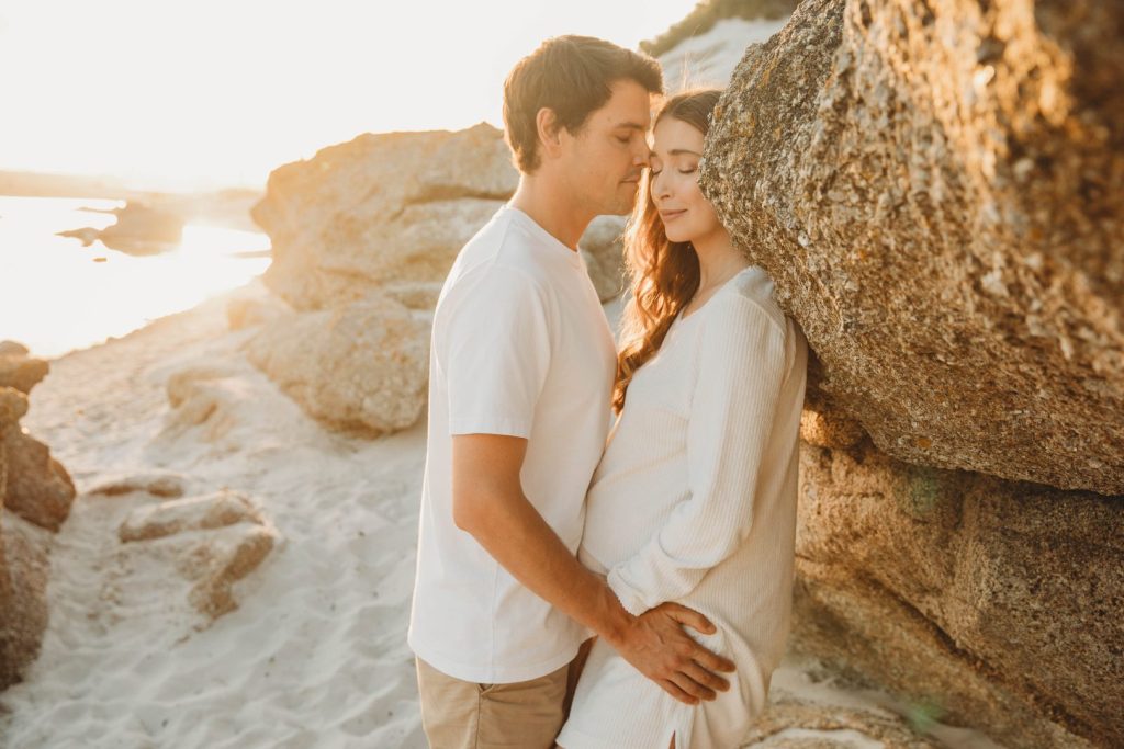 Cape Town maternity photographer capturing couple on Noordhoek Beach