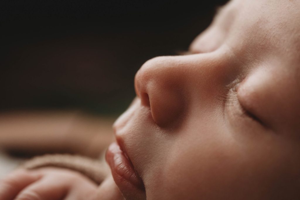 Close-up photo of a newborn baby’s nose and lips in a posed studio setup, Cape Town photographer