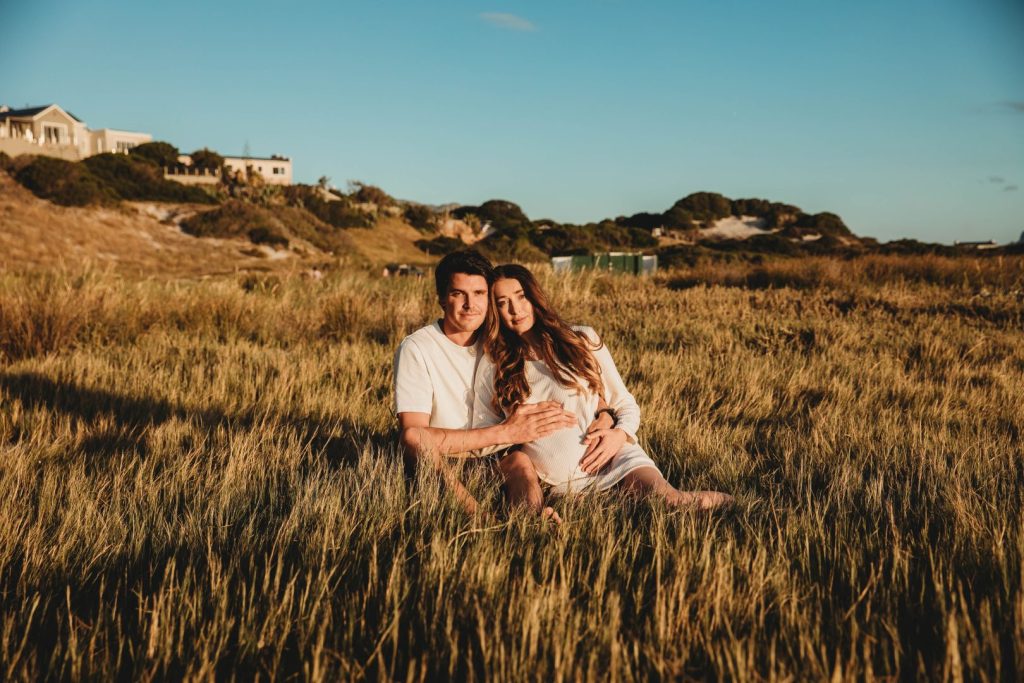 Cape Town maternity photographer capturing couple on Noordhoek Beach