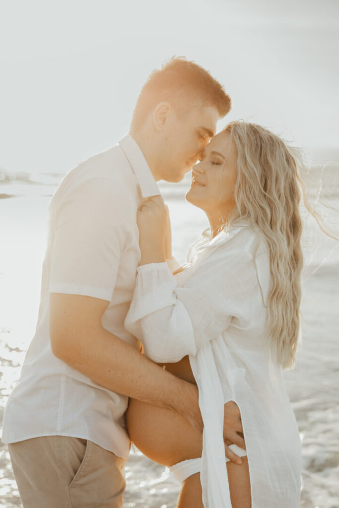 maternity photo shoot in cape town with parents wearing white
